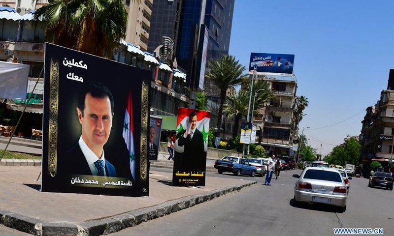 Posters of Syrian presidential candidates are seen in Damascus, Syria, May 16, 2021. The Syrian presidential campaigns have officially started on Sunday as posters of President Bashar al-Assad and the two other candidates filled the squares and streets in the capital Damascus.(Photo:Xinhua)
