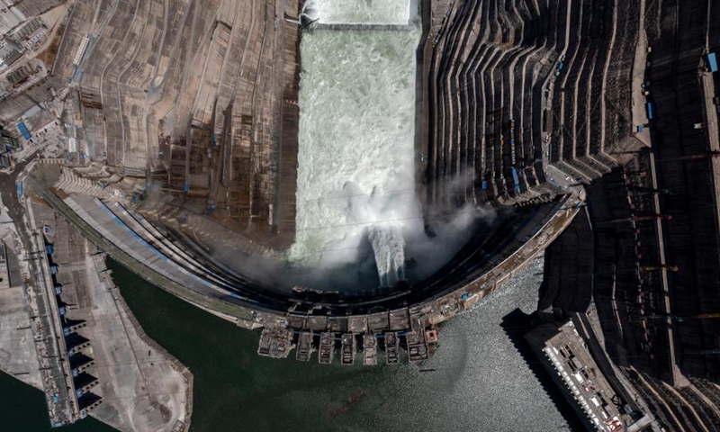 Aerial photo taken on May 13, 2021 shows the view of the Baihetan hydropower station under construction in southwest China. Baihetan on the Jinsha River, the upper section of the Yangtze, straddles the southwest provinces of Yunnan and Sichuan. With a total installed capacity of 16 million kilowatts, it is the second-largest hydropower station in China in terms of installed capacity, second only to the Three Gorges Dam project in the central province of Hubei.(Xinhua/Jiang Wenyao)