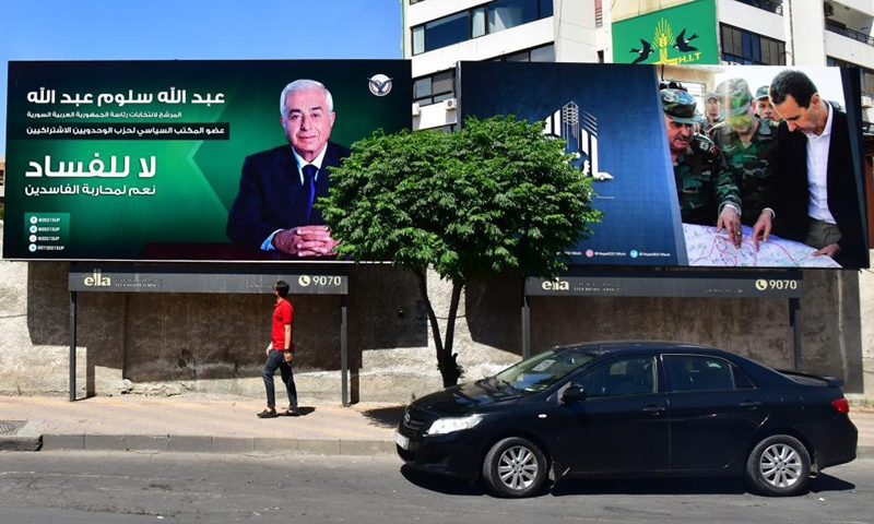 Posters of Syrian presidential candidates are seen in Damascus, Syria, May 16, 2021. The Syrian presidential campaigns have officially started on Sunday as posters of President Bashar al-Assad and the two other candidates filled the squares and streets in the capital Damascus.(Photo:Xinhua)