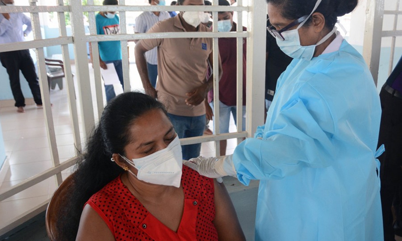 A woman receives a dose of Chinese Sinopharm vaccine amid severe COVID-19 situation in Gampaha, on the outskirts of Colombo, Sri Lanka, May 10, 2021.(Photo: Xinhua)