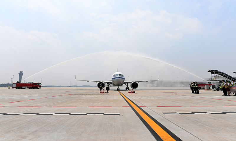 The first plane lands at Chengdu Tianfu International Airport in Southwest China's Sichuan Province, which was officially opened on Sunday. The airport is expected to see 60 million passenger trips and cargo throughput of 1.3 million tons each year. Photo: cnsphoto 
