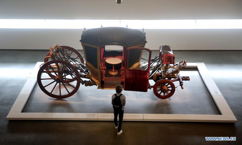 A visitor looks at an exhibit at the National Coach Museum in Lisbon, Portugal, on May 18, 2021. Portugal marked International Museum Day on Tuesday with guided tours, workshops and free admission to all museums.(Photo: Xinhua)