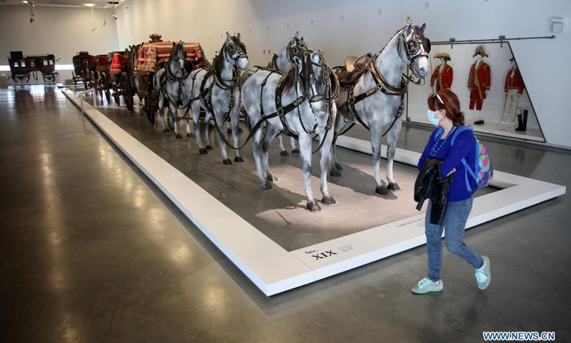 A woman visits the National Coach Museum in Lisbon, Portugal, on May 18, 2021. Portugal marked International Museum Day on Tuesday with guided tours, workshops and free admission to all museums.(Photo: Xinhua)