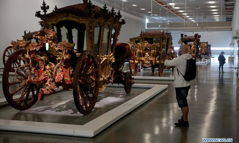 People visit the National Coach Museum in Lisbon, Portugal, on May 18, 2021. Portugal marked International Museum Day on Tuesday with guided tours, workshops and free admission to all museums.(Photo: Xinhua)