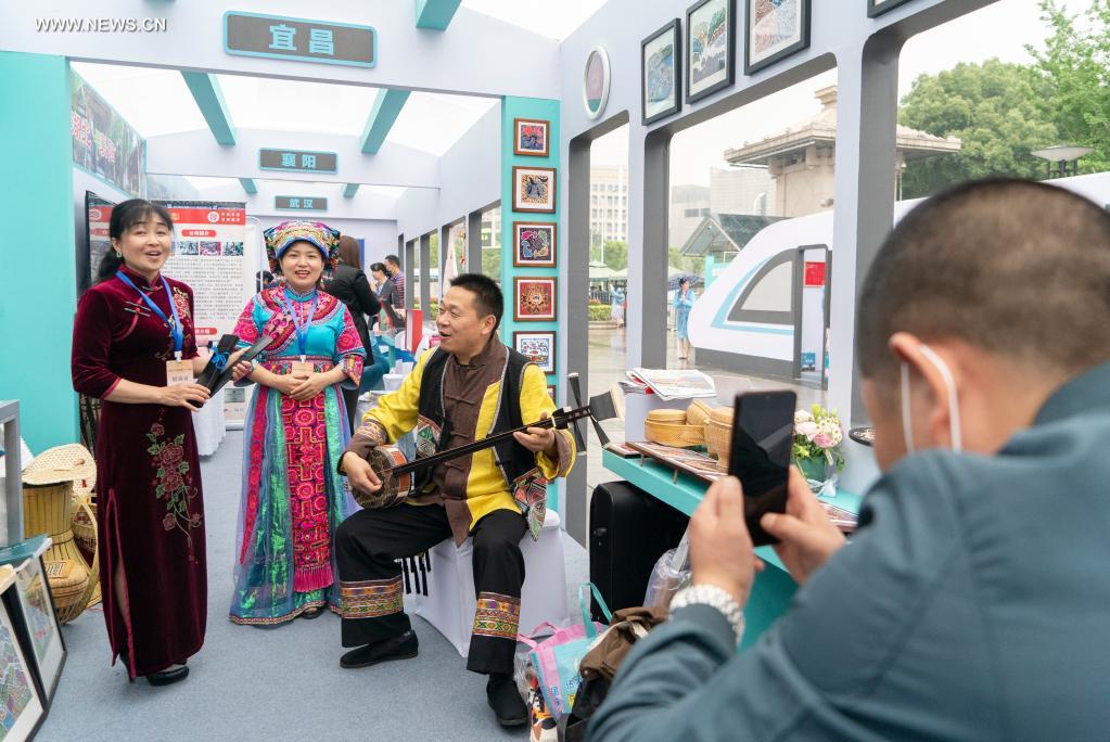 A visitor takes photos during the main-site events for the China Tourism Day 2021 at the Hubei Provincial Museum in Wuhan of central China's Hubei Province, on May 19, 2021. Main-site events for the China Tourism Day 2021 kicked off on Wednesday at the Hubei Provincial Museum under the theme of green development, better life.(Photo: Xinhua)