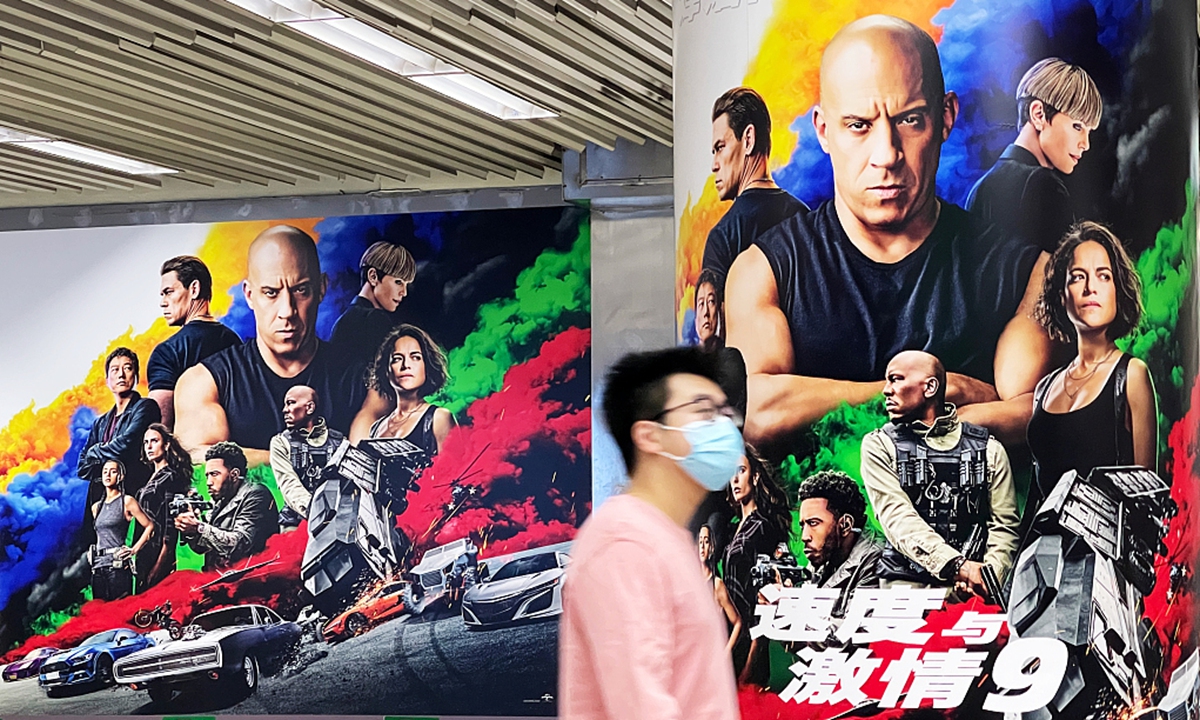A man walks past the posters of  Fast & Furious 9 at a subway station in Beijing on May 16. Photo: VCG