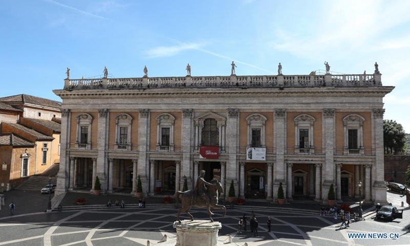 People rest at Piazza del Campidoglio in Rome, Italy, May 18, 2021. The museums officially opened to the public in 1734 during the government of Clemente XII. Its collections are closely linked to the city of Rome and most of the exhibits come from the city itself.(Photo: Xinhua)