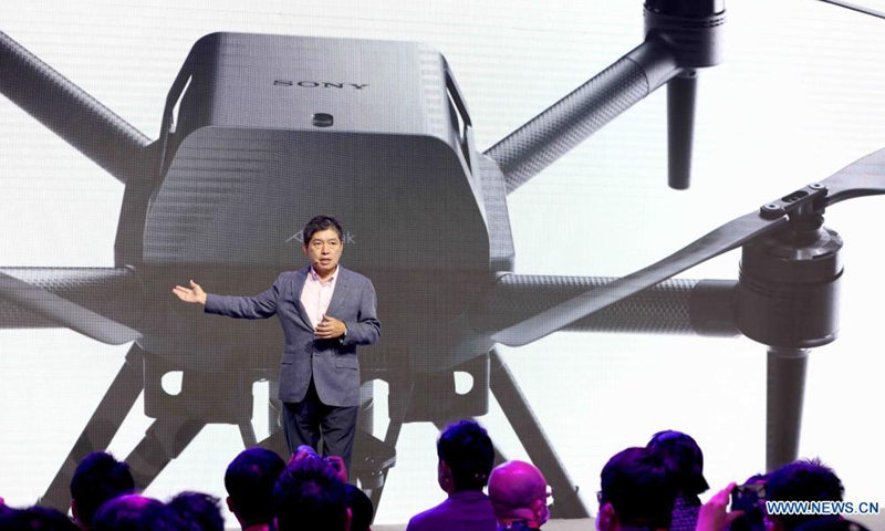 Takahashi Hiroshi, chairman and president of Sony China, introduces a drone at the Sony Expo 2021 in east China's Shanghai, May 20, 2021. The four-day event kicked off here Thursday.(Photo:Xinhua) 