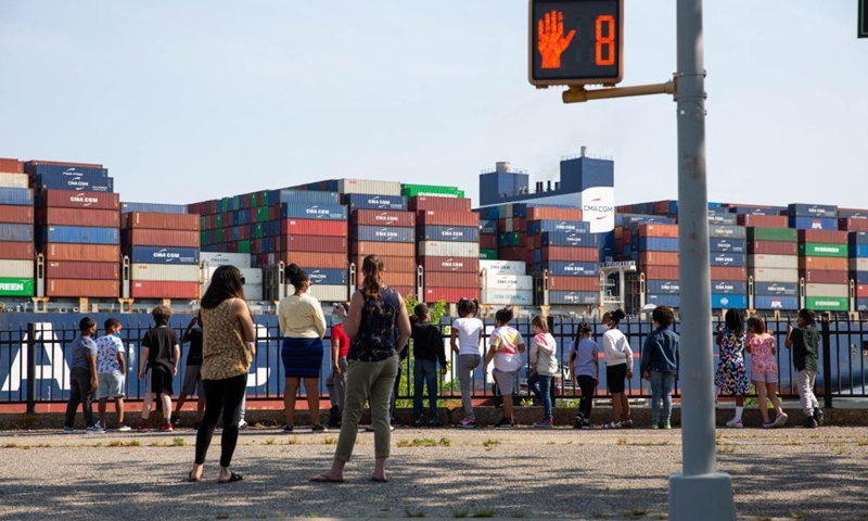 People look at CMA CGM Marco Polo container ship as it travels in the New York Harbor, the United States, on May 20, 2021.(Photo:Xinhua)