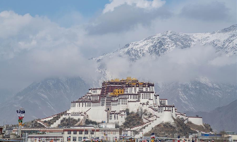 Photo taken on March 19, 2020 shows the Potala Palace after a snowfall in Lhasa, southwest China's Tibet Autonomous Region. The snowfall has improved the soil moisture which is conducive to the ongoing spring sowing.Photo:Xinhua