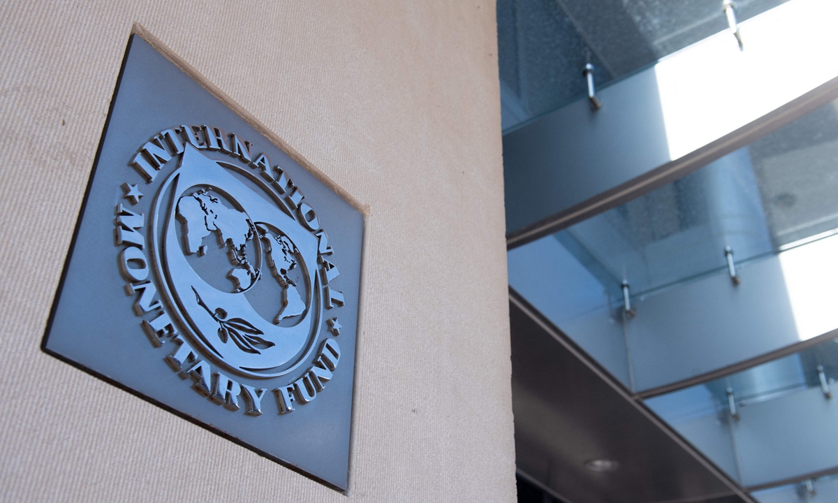 A sign is seen outside the headquarters of the International Monetary Fund (IMF) in Washington DC, the US, on April 15, 2020. Photo: VCG