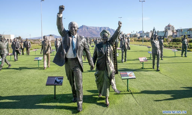 Bronze statues of Nelson Mandela and his wife Winnie Madikizela-Mandela are displayed at a tourist spot named The Long March to Freedom in Cape Town, South Africa, on May 23, 2021. The Long March to Freedom has life-size Bronze statues of 100 individuals who struggled for South Africa's freedom from the early 1700s to Freedom Day in April 1994.(Photo: Xinhua)