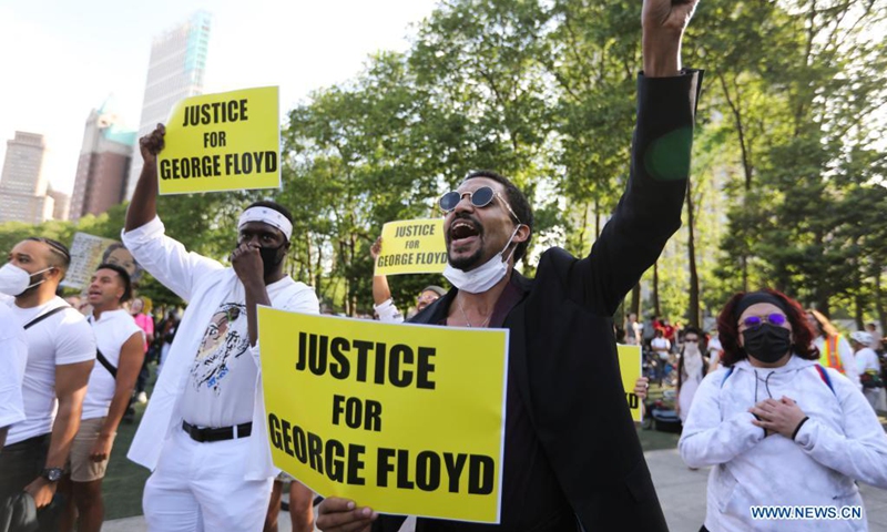 People attend a rally to mark the one-year anniversary of George Floyd's death in Cadman Plaza Park in New York, the United States, May 25, 2021.(Photo: Xinhua)