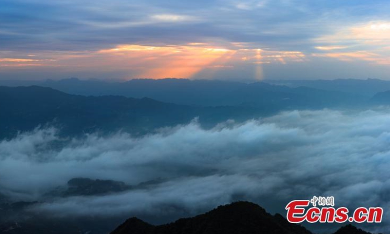 The amazing sea of cloud appears over Mao Ping Township, central China’s Hubei after a downpour. The mountains were shrouded in clouds and mist, resembling a fairyland. (China News Service/Lei Yong)
