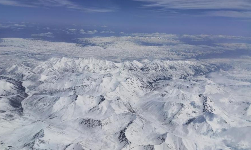 The photo captured on May 23, 2021 shows a snowfall on the Qilian Mountains, on the border of Qinghai and Gansu provinces. Qilian Mountains have an average altitude of 3,500 meters above sea level, renowned by rugged landscape. (China News Service/Cheng Lin)
