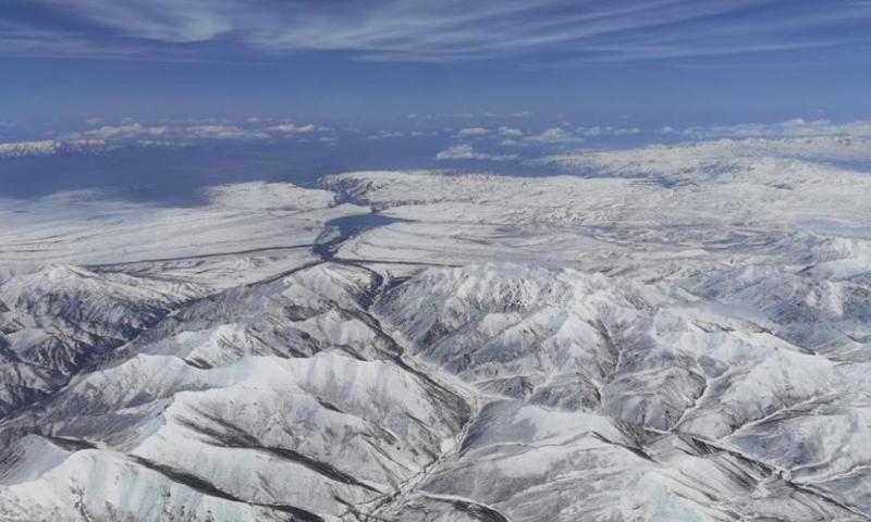 The photo captured on May 23, 2021 shows a snowfall on the Qilian Mountains, on the border of Qinghai and Gansu provinces. Qilian Mountains have an average altitude of 3,500 meters above sea level, renowned by rugged landscape. (China News Service/Cheng Lin)