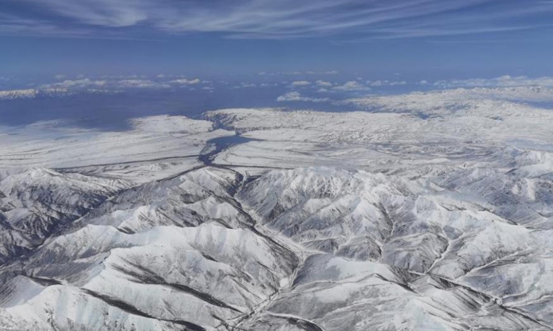 The photo captured on May 23, 2021 shows a snowfall on the Qilian Mountains, on the border of Qinghai and Gansu provinces. Qilian Mountains have an average altitude of 3,500 meters above sea level, renowned by rugged landscape. (China News Service/Cheng Lin)
