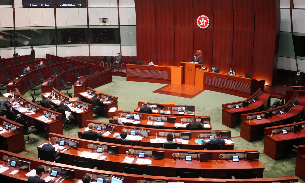 The Legislative Council of Hong Kong holds a meeting for the second reading of the bill to improve the Hong Kong electoral system on Thursday. Photo: cnsphoto