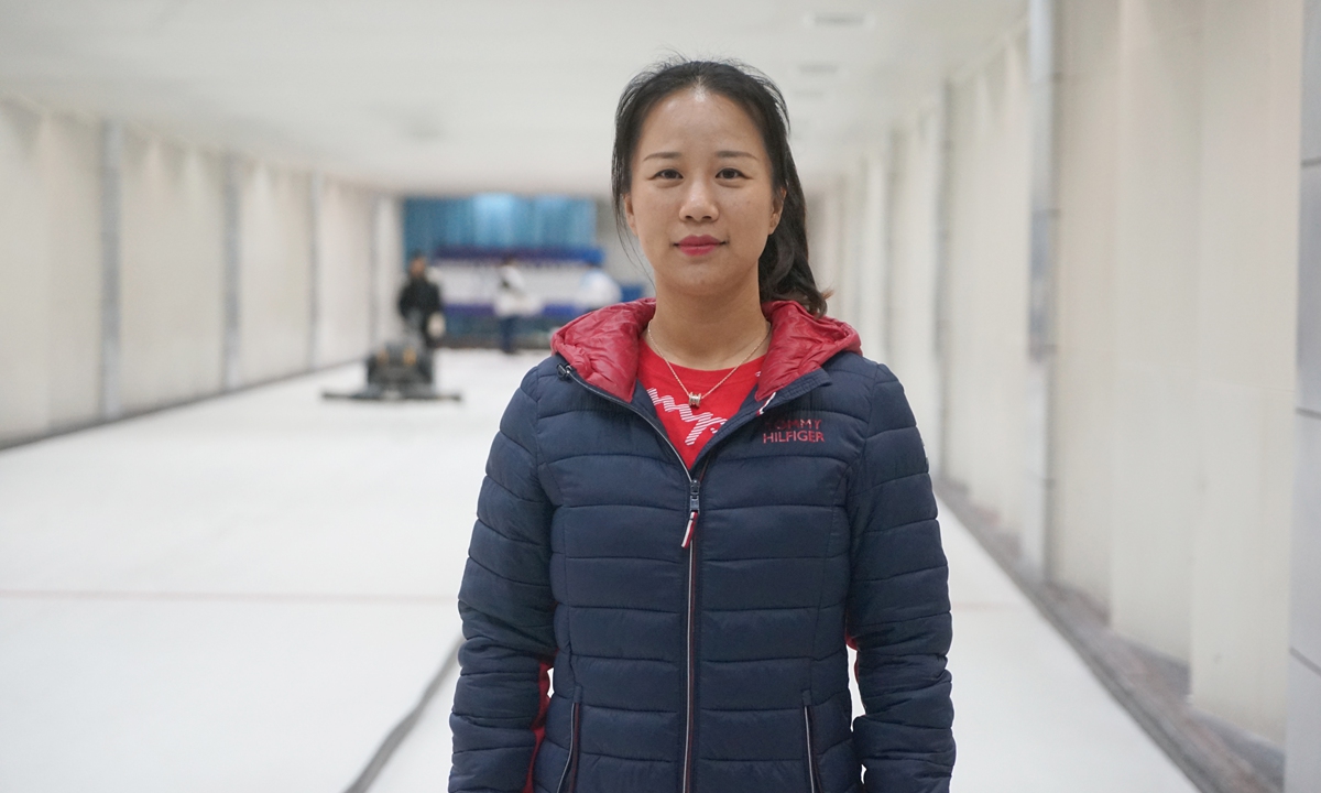 Li Lingshu at a curling site in Shanghai. Li will act as deputy chief timer, the first time that a Chinese will work as a curling umpire in the Winter Olympic Games. Photo: Chen Xia/GT