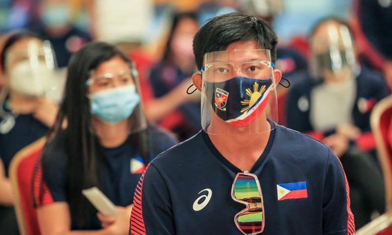 Athletes wait to receive COVID-19 vaccines in Manila, the Philippines on May 28, 2021. Around 700 athletes including dozens of athletes who are qualified for the Tokyo Olympics and are about to participate in the Olympic trials, as well as those who will participate in this year's Southeast Asian Games were vaccinated.Photo:Xinhua