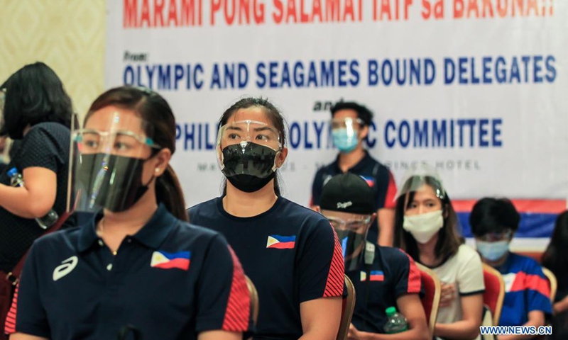 Athletes are seen after they received COVID-19 vaccines in Manila, the Philippines on May 28, 2021. Around 700 athletes including dozens of athletes who are qualified for the Tokyo Olympics and are about to participate in the Olympic trials, as well as those who will participate in this year's Southeast Asian Games were vaccinated.Photo:Xinhua