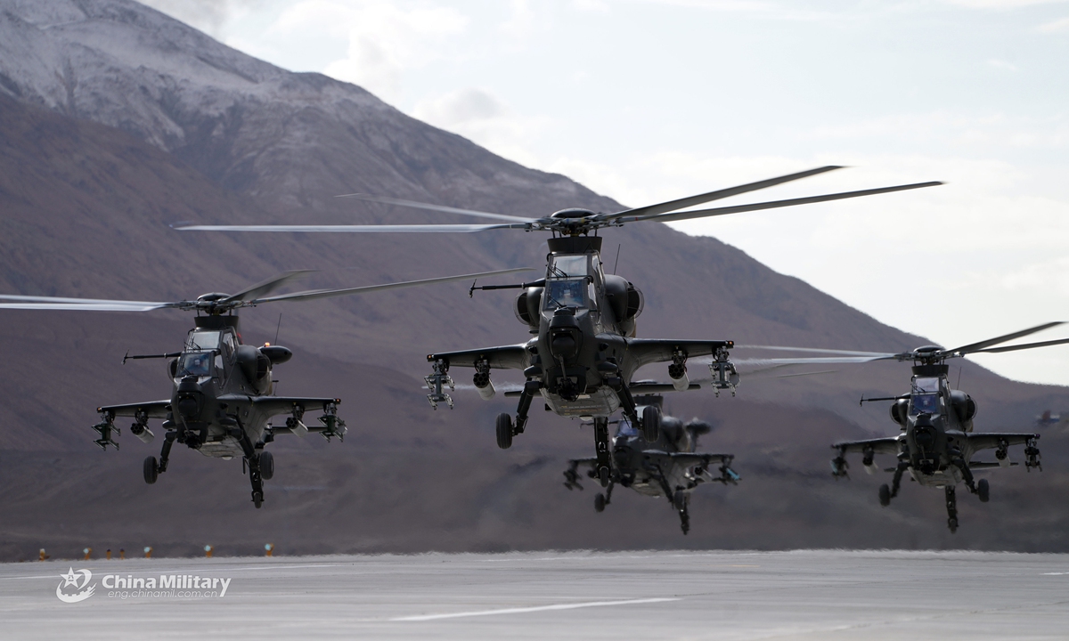 Attack helicopters assigned to an army aviation brigade under the PLA Xinjiang Military Command take off for a live-fire training exercise in the hinterland of the Karakoram Range at an altitude of nearly 5000 meters in late May, 2021. (eng.chinamil.com.cn/Photo by Wu Shike)