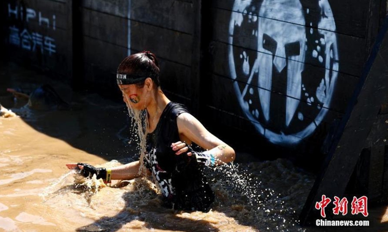 The 2021 Spartan Beijing Race is held on May 29. The Spartan Beijing Race, that has attracted nearly 7,000 participants, is composed of Sprint Race, Super Race, Kids Race and Four-hour Hurricane Heat. (Photo: China News Service/Fu Tian)
