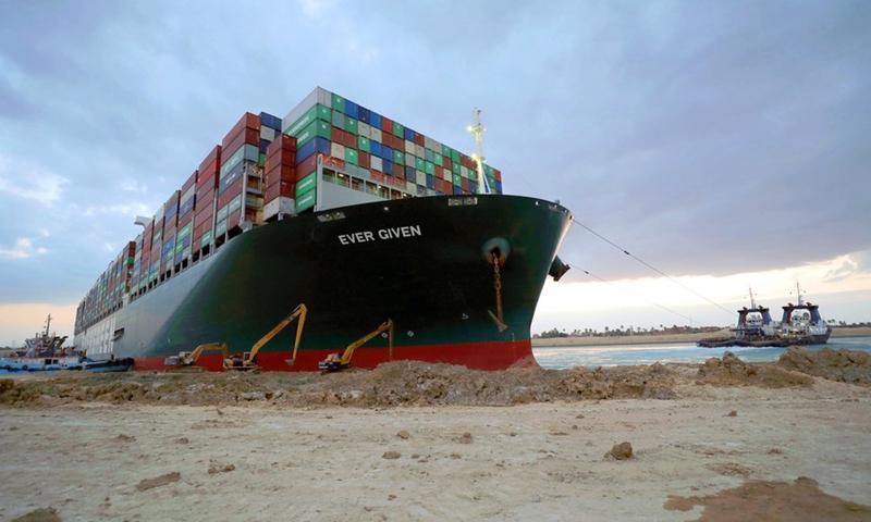 Rescue vessels work at the site of the grounded container ship Ever Given on the Suez Canal, Egypt, March 28, 2021.(Photo: Xinhua)