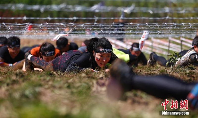 The 2021 Spartan Beijing Race is held on May 29. The Spartan Beijing Race, that has attracted nearly 7,000 participants, is composed of Sprint Race, Super Race, Kids Race and Four-hour Hurricane Heat. (Photo: China News Service/Fu Tian)