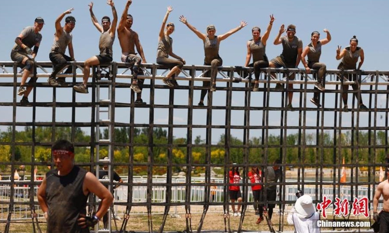 The 2021 Spartan Beijing Race is held on May 29. The Spartan Beijing Race, that has attracted nearly 7,000 participants, is composed of Sprint Race, Super Race, Kids Race and Four-hour Hurricane Heat. (Photo: China News Service/Fu Tian)