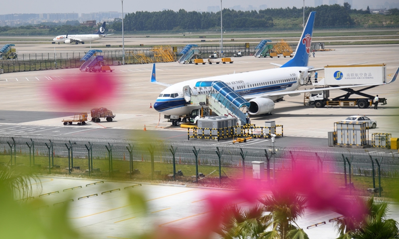 File photo shows a passenger plane at Guangzhou Baiyun International Airport in south China's Guangdong Province. Photo: Xinhua