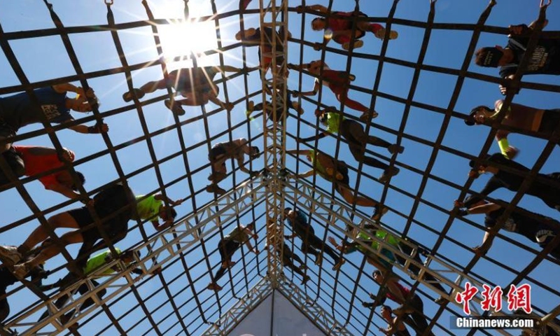 The 2021 Spartan Beijing Race is held on May 29. The Spartan Beijing Race, that has attracted nearly 7,000 participants, is composed of Sprint Race, Super Race, Kids Race and Four-hour Hurricane Heat. (Photo: China News Service/Fu Tian)