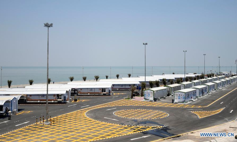 Photo taken on May 30, 2021 shows a drive-through vaccination center in Kuwait City, Kuwait. Kuwait inaugurated on Sunday the drive-through vaccination center to speed up nationwide inoculation.(Photo: Xinhua)