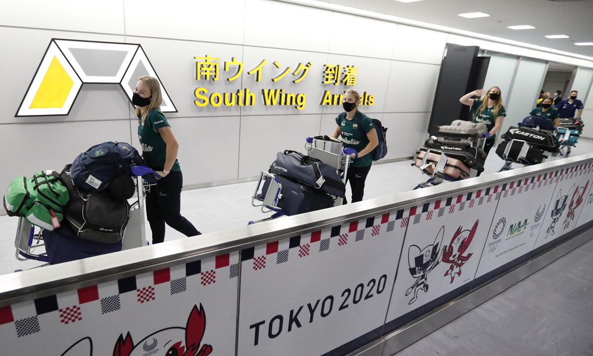 Members of Australia's Olympic softball team arrive at Narita international airport in Narita, east of Tokyo on Tuesday. Photo: AFP