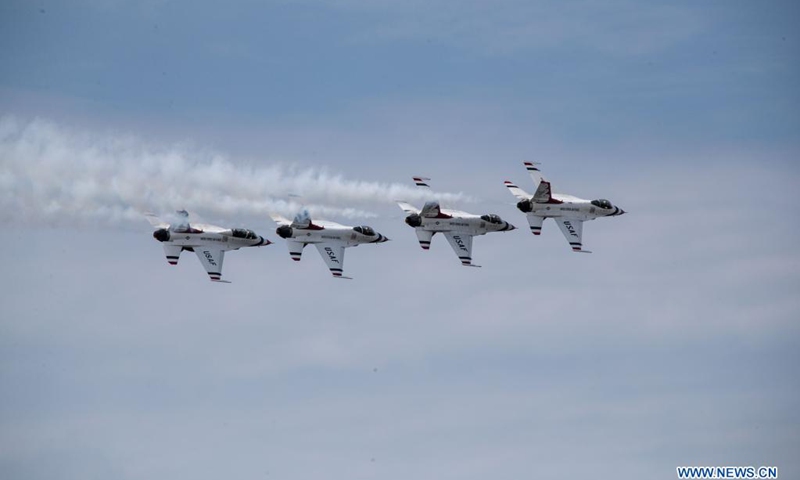 Jets of the United States Air Force Thunderbirds perform during the Bethpage Air Show at Jones Beach on Long Island of New York, the United States, May 31, 2021. Postponed over the weekend due to bad weather, Bethpage Air Show was staged Monday at Jones Beach on Long Island featuring military planes flying in formations and parachuting along with colorful smokes.Photo:Xinhua
