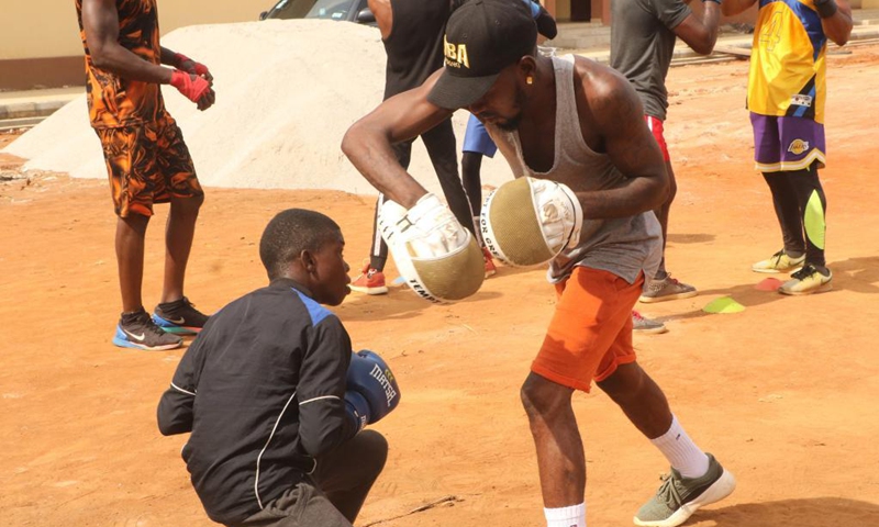 Photo taken on April 24, 2021 shows Sultan Adekoya (L, Front) in training in Lagos, Nigeria.(Photo: Xinhua)