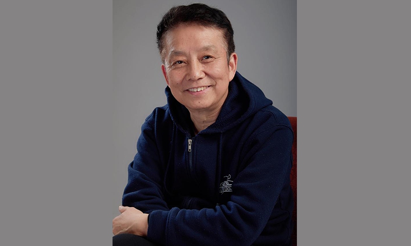 Chinese film director and producer Huang Jianxin
