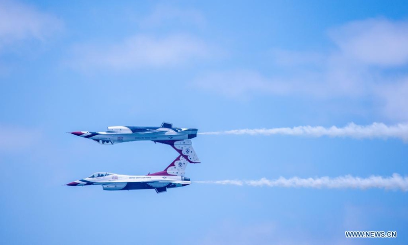 Jets of the United States Air Force Thunderbirds perform during the Bethpage Air Show at Jones Beach on Long Island of New York, the United States, May 31, 2021. Postponed over the weekend due to bad weather, Bethpage Air Show was staged Monday at Jones Beach on Long Island featuring military planes flying in formations and parachuting along with colorful smokes.Photo:Xinhua