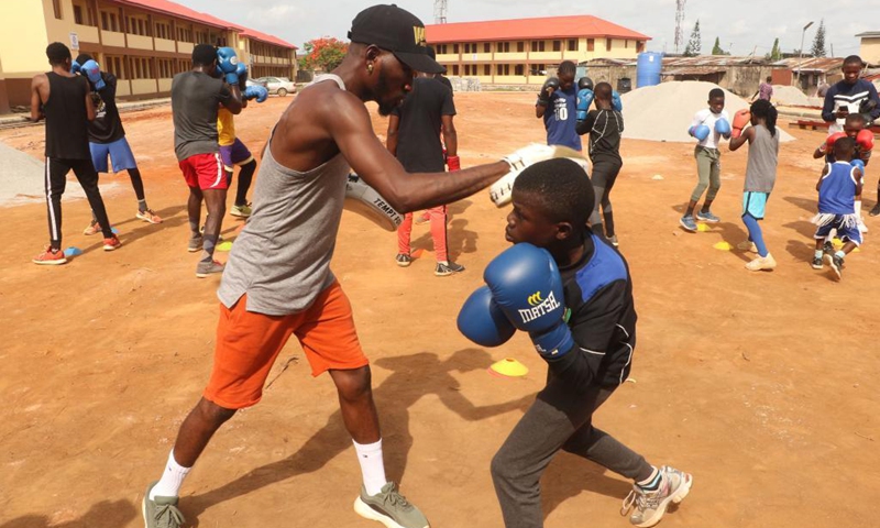 Photo taken on April 24, 2021 shows Sultan Adekoya (R, Front) in training in Lagos, Nigeria.(Photo: Xinhua)
