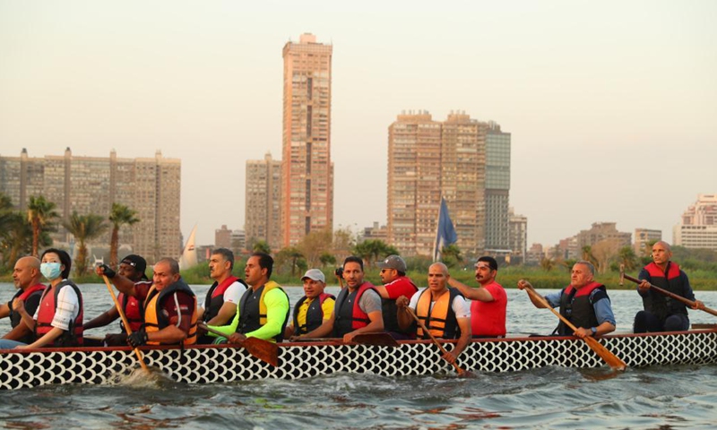 Paddlers from Dragon Boat Egypt Academy attend a dragon boat training session in Cairo, Egypt, June 2, 2021. Dragon Boat Egypt Academy has organized a number of local and international dragon boat festivals in Egypt since 2016 to promote cultural exchanges. (Xinhua/Sui Xiankai)