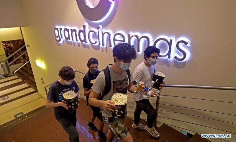 People are seen in a cinema in Beirut, Lebanon, on June 2, 2021. Lebanese caretaker Health Minister Hamad Hassan praised on Tuesday Lebanon's success in reducing remarkably the number of COVID-19 infections. (Photo by Bilal Jawich/Xinhua)