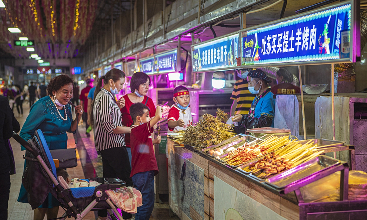 Residents visit a night market on May 30, 2021 in Hotan, Northwest China's Xinjiang Uygur Autonomous Region.Photo: CFP