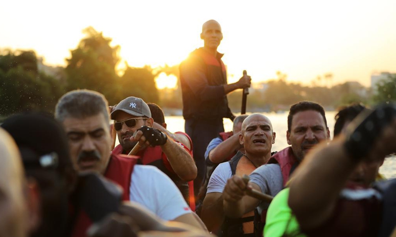 Paddlers from Dragon Boat Egypt Academy attend a dragon boat training session in Cairo, Egypt, June 2, 2021. Dragon Boat Egypt Academy has organized a number of local and international dragon boat festivals in Egypt since 2016 to promote cultural exchanges. (Xinhua/Sui Xiankai)