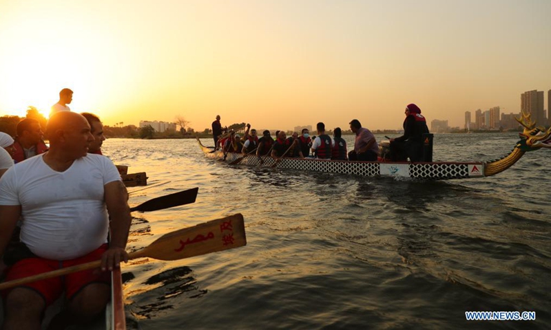 Paddlers from Dragon Boat Egypt Academy attend a dragon boat training session in Cairo, Egypt, June 2, 2021. Dragon Boat Egypt Academy has organized a number of local and international dragon boat festivals in Egypt since 2016 to promote cultural exchanges. (Xinhua/Sui Xiankai)