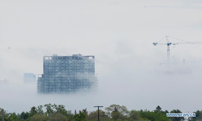 Buildings are shrouded in fog in Toronto, Canada, on June 3, 2021. Photo: Xinhua