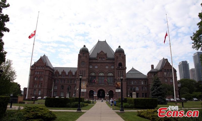 The National Flag of Canada flies at half-mast on Legislative Assembly of Ontario, Toronto, Ontario, Canada, June 2, 2021.Photo:China News Service