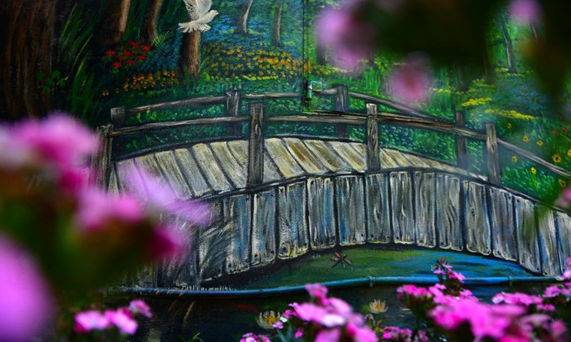 A mural created by artist Nathalie Micallef is seen at the Peace Garden in Gharghur, Malta, on June 3, 2021. Micallef has spent all her free time since January turning blank walls here into vibrant visuals.  Photo: Xinhua