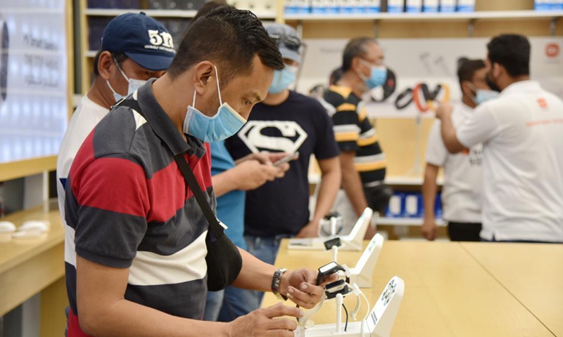 People visit the Mi-store in the Electron Commercial Center in Riyadh, Saudi Arabia, on June 4, 2021. China's tech company Xiaomi, known for its smartphones, opened its first Mi-store in Saudi Arabia on Thursday.Photo:Xinhua