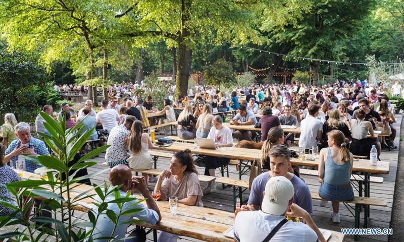 People are seen at a beer garden in Berlin, Germany, June 5, 2021. Germany will lift its vaccination prioritization scheme on June 7, making all citizens older than 12 years eligible to receive a COVID-19 vaccination, Minister of Health Jens Spahn announced on June 2. (Photo by Stefan Zeitz/Xinhua)