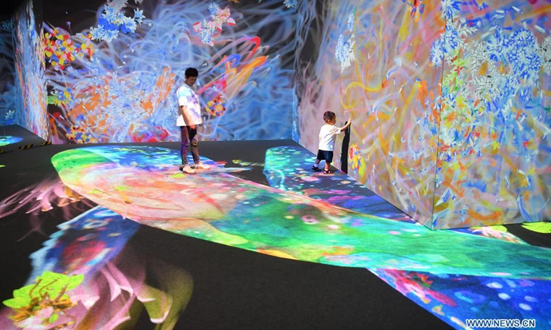 People visit the teamLab Future Park during an art festival themed on science and technology in Xi'an, northwest China's Shaanxi Province, June 6, 2021.(Photo: Xinhua)